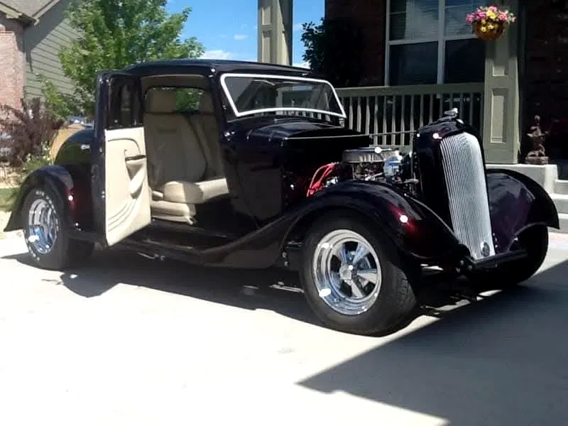 Black Plymouth hot rod from Hector’s classic vehicle project portfolio, photographed outdoors