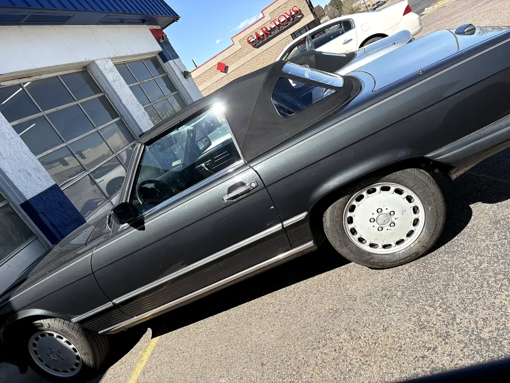 Mercedes-Benz SL convertible with black soft top
