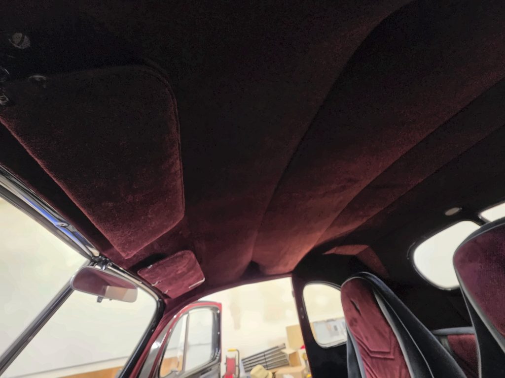 Burgundy headliner material and shaped automotive roof lining, third project angle